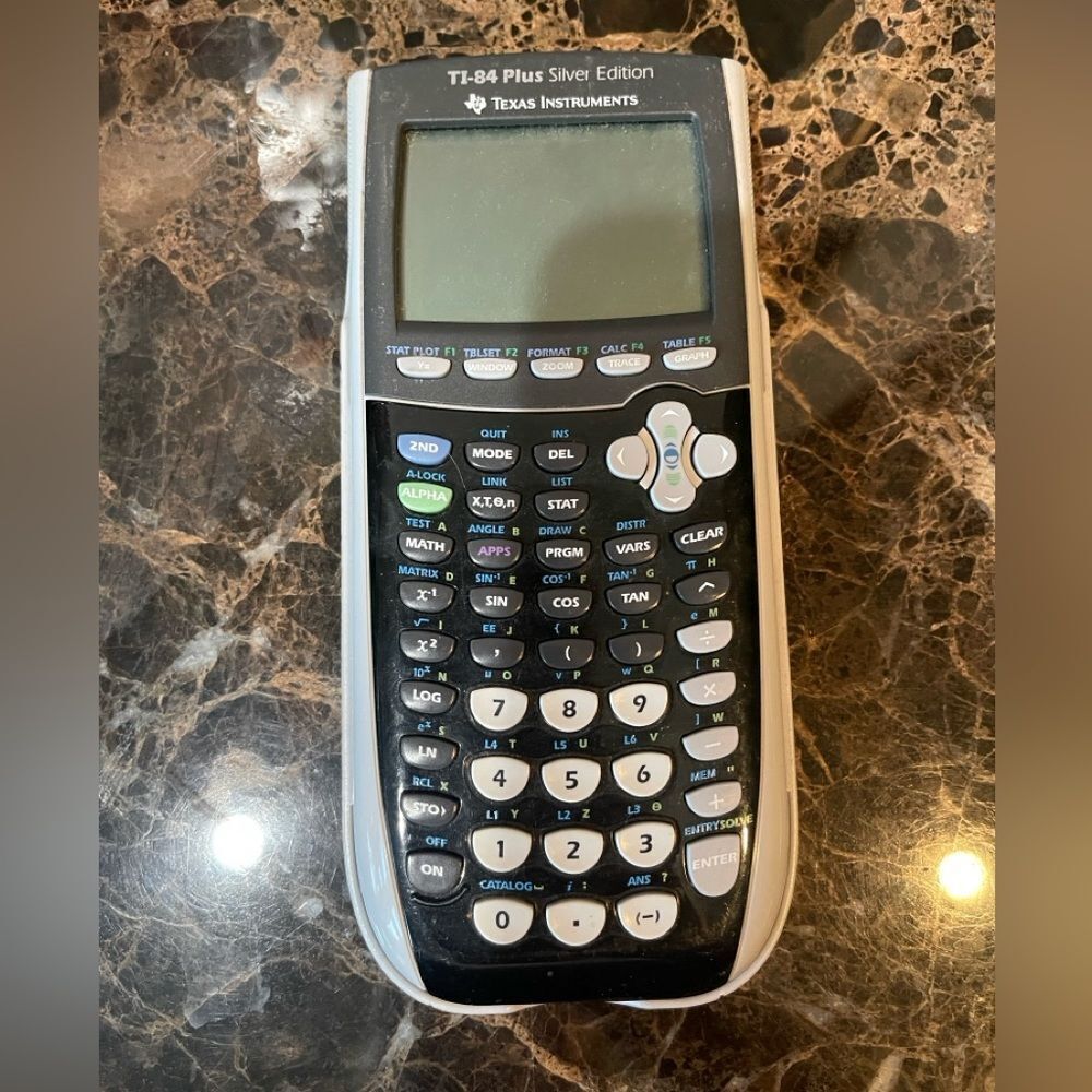TI-84 Plus Silver Edition Calculator from Texas Instruments Used